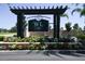 West Lucaya Village Resort entrance sign with landscaping at 3227 Cupid Pl, Kissimmee, FL 34747