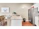 Kitchen with granite countertops and stainless steel appliances at 3227 Cupid Pl, Kissimmee, FL 34747