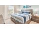 Comfortable bedroom with a king-size bed and wood frame at 3227 Cupid Pl, Kissimmee, FL 34747