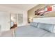 Bedroom with king-size bed and inspiring wall art at 3227 Cupid Pl, Kissimmee, FL 34747