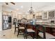 Gourmet kitchen boasts stainless steel appliances and custom cabinetry at 7459 Gathering Dr, Reunion, FL 34747