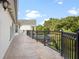 Spacious balcony overlooking the pool and backyard at 7459 Gathering Dr, Reunion, FL 34747