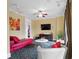 Relaxing living room with red couch and flat screen TV at 7459 Gathering Dr, Reunion, FL 34747