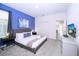 Spacious bedroom with a king-size bed and en-suite bathroom at 3028 Protagonist St, Kissimmee, FL 34746