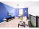 Multipurpose loft area with TV, desk, and comfortable seating at 3028 Protagonist St, Kissimmee, FL 34746