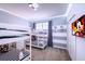Mickey Mouse themed bedroom with bunk beds and TV at 3028 Protagonist St, Kissimmee, FL 34746