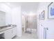 Clean bathroom with a shower/tub combo and single vanity at 3028 Protagonist St, Kissimmee, FL 34746