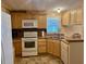 Kitchen features ample cabinetry, modern appliances, and a double sink at 5013 Foxwood Blvd, Lakeland, FL 33810