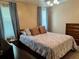 Bedroom with double bed and dresser at 5013 Foxwood Blvd, Lakeland, FL 33810