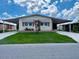 Quaint single-wide manufactured home with carport at 5013 Foxwood Blvd, Lakeland, FL 33810
