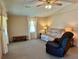 Spacious living room with ample seating and ceiling fan at 5013 Foxwood Blvd, Lakeland, FL 33810