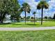 Peaceful lakefront community with walking paths and picnic tables at 5013 Foxwood Blvd, Lakeland, FL 33810