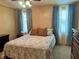 Bedroom with a double bed and two windows at 5013 Foxwood Blvd, Lakeland, FL 33810