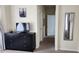 Bedroom with dresser, TV, and hallway access at 730 Brunello Dr, Davenport, FL 33897