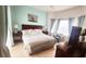 Comfortable bedroom with king-size bed and TV at 730 Brunello Dr, Davenport, FL 33897