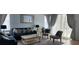 Relaxing living room featuring a sofa and armchairs at 730 Brunello Dr, Davenport, FL 33897