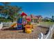 Community playground with colorful equipment at 730 Brunello Dr, Davenport, FL 33897