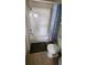 Clean bathroom with tub, shower, and tile flooring at 730 Brunello Dr, Davenport, FL 33897