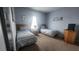 Bedroom with two twin beds and nightstands at 730 Brunello Dr, Davenport, FL 33897