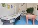 Game room with air hockey, foosball, and bar stools at 730 Brunello Dr, Davenport, FL 33897