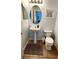 Clean bathroom with pedestal sink and toilet at 730 Brunello Dr, Davenport, FL 33897