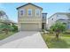 Two-story home with a two car garage at 3920 Saltmarsh Loop, Sanford, FL 32773