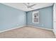Spacious bedroom with ceiling fan and neutral carpeting at 3920 Saltmarsh Loop, Sanford, FL 32773