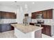 Modern kitchen with granite countertops and stainless steel appliances at 3920 Saltmarsh Loop, Sanford, FL 32773