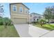 Two-story home with a two car garage at 3920 Saltmarsh Loop, Sanford, FL 32773