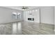 Spacious living area featuring a modern fireplace and tile floors at 3920 Saltmarsh Loop, Sanford, FL 32773