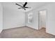 Bedroom with ceiling fan, window, closet, and neutral carpet at 3920 Saltmarsh Loop, Sanford, FL 32773
