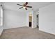 Bedroom with ceiling fan and en-suite bathroom access at 3920 Saltmarsh Loop, Sanford, FL 32773