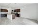 Modern kitchen featuring granite countertops and stainless steel appliances at 3920 Saltmarsh Loop, Sanford, FL 32773