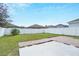 Large backyard with grassy lawn and patio area at 3920 Saltmarsh Loop, Sanford, FL 32773