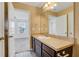 Bathroom with vanity, mirror, and access to bedroom at 3920 Saltmarsh Loop, Sanford, FL 32773