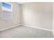 Bright bedroom with carpeted floor and a window offering natural light at 4252 Sawtooth Ct, Tavares, FL 32778