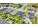 An aerial view of the home's backyard and surrounding properties, with a pool and patio area at 2894 Mosshire Cir, Saint Cloud, FL 34772