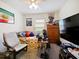 Bedroom space with additional gaming/entertainment area at 2894 Mosshire Cir, Saint Cloud, FL 34772