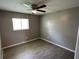 Well-lit bedroom with ceiling fan and vinyl flooring at 725 Northlake Blvd # 52, Altamonte Springs, FL 32701