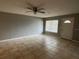 Living room with tile floors, neutral gray walls, and a window at 725 Northlake Blvd # 52, Altamonte Springs, FL 32701