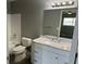 Updated bathroom with vanity, toilet, and bathtub at 725 Northlake Blvd # 52, Altamonte Springs, FL 32701