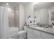 Bathroom with shower/tub combo and granite vanity at 4801 Sparkling Shell Ave, Kissimmee, FL 34746