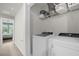 Laundry closet with washer and dryer included at 4801 Sparkling Shell Ave, Kissimmee, FL 34746