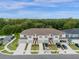 Aerial view of townhomes with garages at 4801 Sparkling Shell Ave, Kissimmee, FL 34746