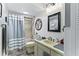 Clean bathroom with tub, shower, and vanity at 15 Escondido Cir # 141, Altamonte Springs, FL 32701