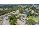 Aerial view of community featuring a lake and numerous residences at 15 Escondido Cir # 141, Altamonte Springs, FL 32701