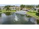 Aerial view of community with lake and pool at 15 Escondido Cir # 141, Altamonte Springs, FL 32701
