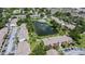 Aerial view showcasing community lake, buildings, and parking areas at 15 Escondido Cir # 141, Altamonte Springs, FL 32701