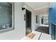 Building exterior with walkway and black door at 15 Escondido Cir # 141, Altamonte Springs, FL 32701