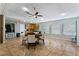Community room with table and chairs, ideal for gatherings at 15 Escondido Cir # 141, Altamonte Springs, FL 32701